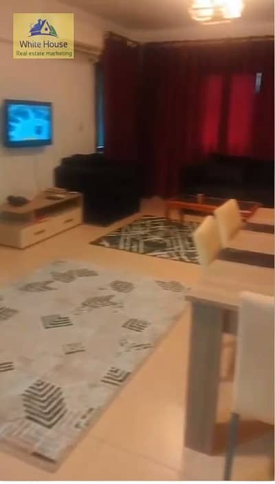 Two-bedroom furnished apartment for rent in Madinat Al-Rehab, in front of the Eastern Market
