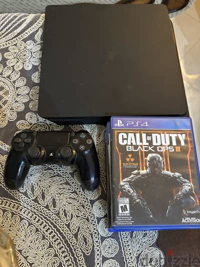 Ps4 Slim Good condition with 4 games and 2 controllers