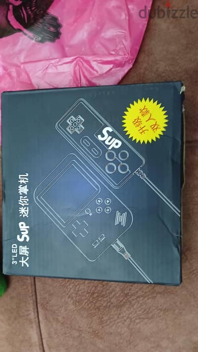 جهاز اتاري SUP ومعاه الدراعه بتاعو زيروو الي عليها ٤٠٠ لعبه