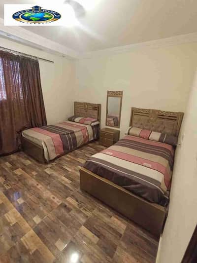 Furnished apartment for rent in Maadi near the metro station and 9th Street consists of three bedrooms and a reception 2 bathrooms and a fully air-conditioned kitchen Wi-Fi natural gas eleventh floor elevator distinguished location