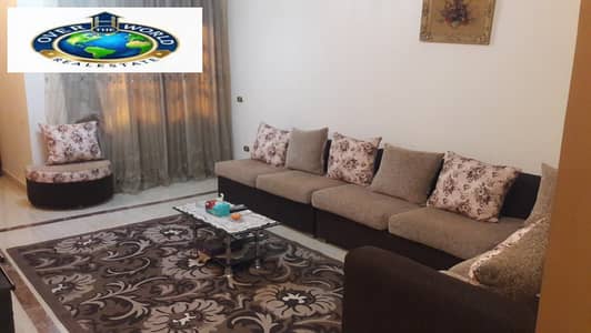 Furnished apartment for rent in Zahraa El Maadi, branching off from Al-Khamsin Street, consisting of three bedrooms, a reception area, a bathroom, and a kitchen. Eleventh floor with an elevator, not the last one, has three air conditioners and Wi-Fi, located with all the services.