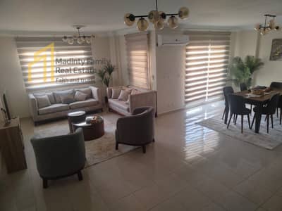 140 meter furnished apartment first residence b10 garden view the key is available at any time next to the mosque and services directly