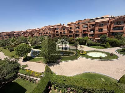 Duplex for rent with kitchen and air conditioning, view of the balconies in Green 3 Compound - Sheikh Zayed