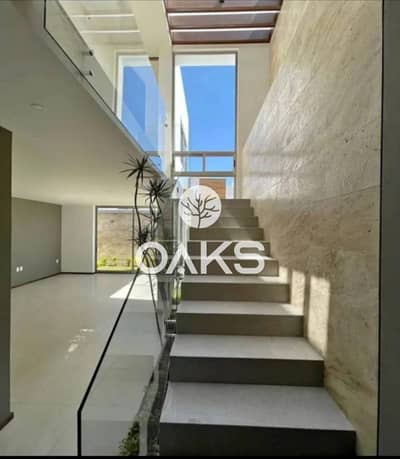 Villa for sale, fully finished, 221 m, in Sodic East Compound, New Cairo, in front of Madinaty, with installments over the longest period