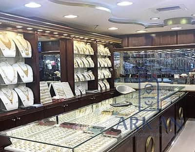 محل دهب 22 متر امام كمبوند المستثمرين حدايق اكتوبر بمقدم400 الف BA