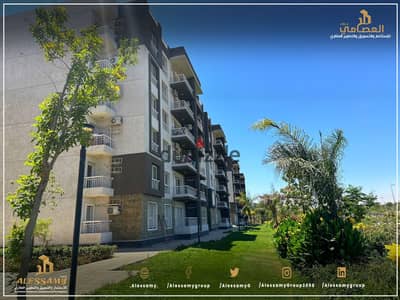 For sale, an apartment of 107 square meters in Madinaty B14 with a wide garden view on a repeat floor.