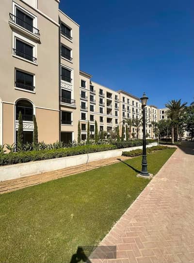 Apartment for rent inside the Village West compound - Sheikh Zayed - Ground floor with a private garden, first occupancy - Prime location with full finishing