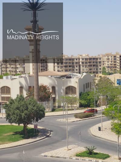 For sale, a distinguished apartment in Madinaty B6, area 89 square meters, 2 bedrooms, 2 bathrooms, reception in two pieces, fourth floor (not the last), completely nautical, prime location in front of Mahmoud El-Far. The asking price is 3,300,000 EGP, with only 5 installments remaining, each costing 390,000 EGP, the next installment in November. A unique opportunity for living or investment.