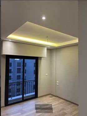 Apartment for sale in the Village West compound with an area of: 75 meters on the fifth floor - landscape view, phase one