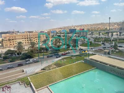 مكتب للايجار متشطب بالتكييفات في arkan plaza فيو المحور 85 متر