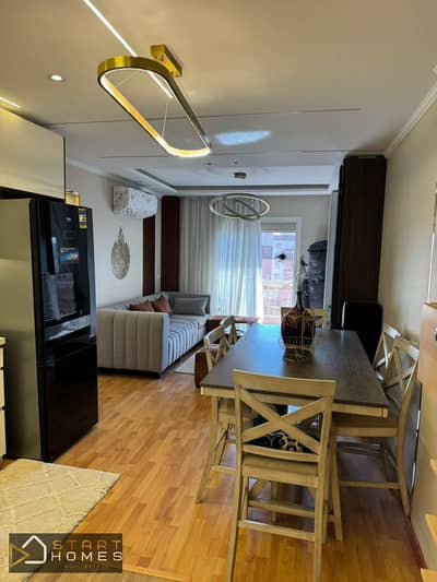 78 sq m, 2-bedroom furnished apartment for rent in Madinaty B12. Fully equipped American kitchen. Minutes from Craft Zone and East Hub Mall.