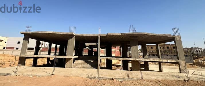 أرض بالمبانى ١٠٠٠ متر مربع للبيع - الحى الأول - هليوبوليس الجديدة