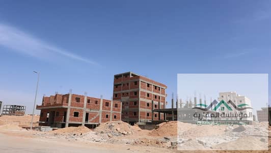Land for sale in Masral 4 - New October - North Airport - Plot area 600 sqm - Prime frontage on a main street - 3 numbers from the main gas line - at