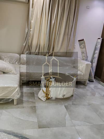 Apartment for rent in the Violet Villas, with an area of 350 square meters, excellent location on a main street, stylish front, first occupancy, fully air-conditioned, equipped kitchen, furnished with chandeliers, excellent location