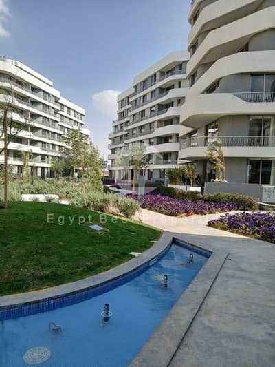 Prime location Semi finished downpayment and installments 3 bedrooms apartment for sale in Bloomfield compound Tatweer Masr new cairo