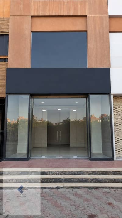 Commercial store in Sheikh Zayed area for sale, area 62.5 meters, fully finished, located in front of the Canadian University.