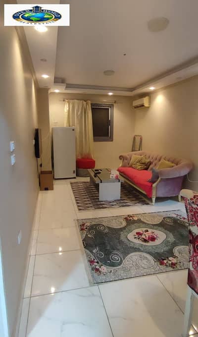 Furnished apartment for rent in Zahra El Maadi on the Ring Road, Maarad El Morshedy, Saryat El Qattamiya, next to Becho Compound, number of rooms 2, bathrooms 2, floor 2, reception, kitchen fully equipped