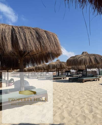 New launch — a fully finished first-row lagoon-view chalet at Marseilia Beach with near-term delivery, available with installment plans over 10 years.