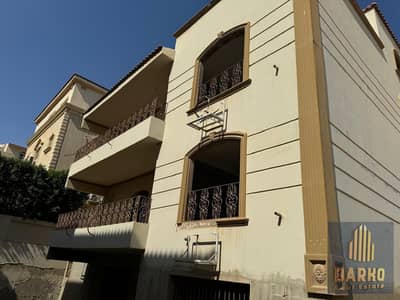 Villa for sale in West Somed, with a garden, usufruct right, corner location, open view, 6th of October City. Built with basement, ground floor, first