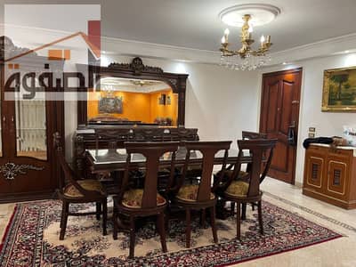 For rent, furnished apartment in Al-Hadaba Al-Ulya, Mokattam, upscale location, 3 rooms, reception, and 2 bathrooms.
