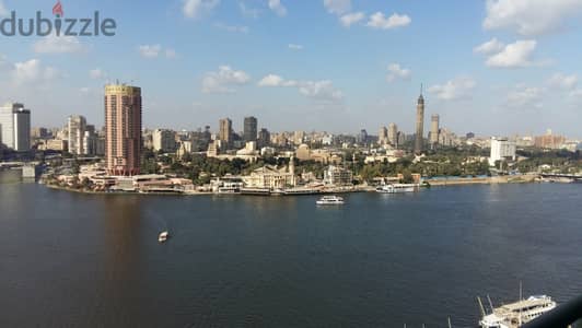 سويت فندقى فاخر للبيع فى نايل بلازا فور سيزونز باجمل اطلالة على النيل