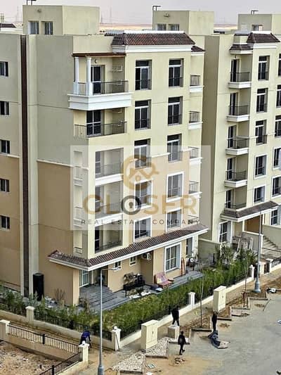 In front of Madinaty with a down payment of 575,000 Own Apartment 3BR in the best Layout of Sarai Compound with inst 12Y