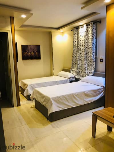 The most luxurious and lavish accommodation in October. Studio for rent in 6th of October, First District, one minute from Nawel Al-Degwy University and Al-Hasri, and close to Must University and Sheikh Zayed. Hotel-style furnished double studio for the first residence.