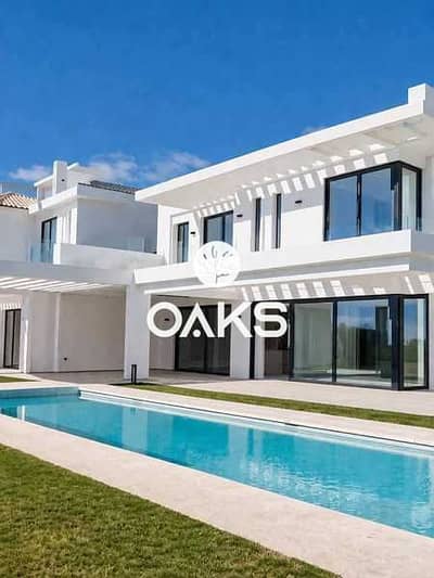 Finished chalet for sale in Hacienda Blue North Coast by Palm Hills, with installments over 10 years.