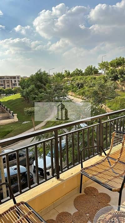 Apartment for sale with a garden, installments available, at a bargain price from the owner in Taj City, New Cairo.