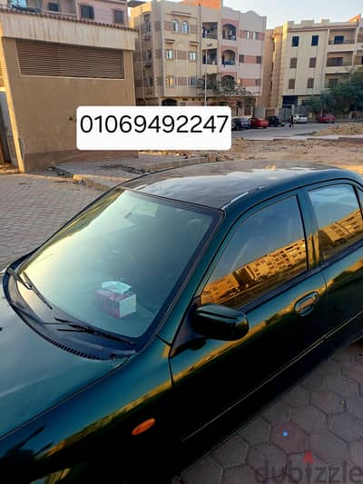 مازدا 323 1999