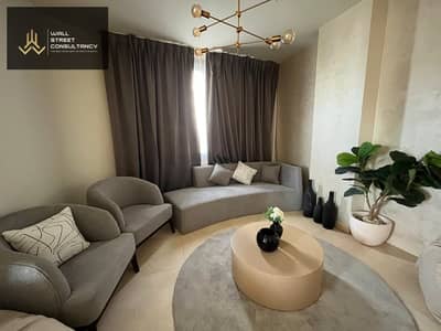 Apartment for sale — pool view overlooking the Green River, located in the heart of the New Administrative Capital.
