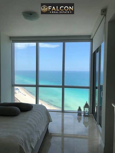 Down 150,000 +In front of the towers, an apartment for sale in New Alamein, North Coast, triple view of the lagoon and Alamein Towers