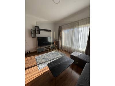 Best price Furnished Studio for rent in The Village New Cairo prime view