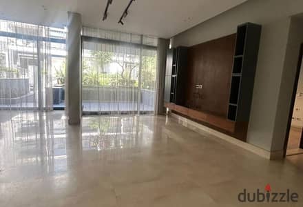 Ground floor apartment for rent with a private garden and lake views in The Waterway Compound.