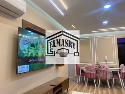 A furnished 89-square-meter apartment with a master bedroom is available for rent in a prime location in Rehab City, New Cairo, Phase 7, First Settlem