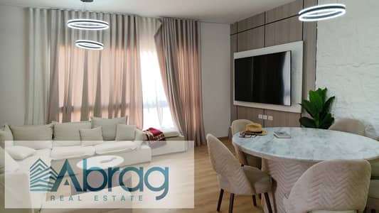 For rent: Ground-floor apartment with a garden in Kayan Compound, 6th of October City. Features 3 bedrooms, a kitchen, and air conditioning; finished