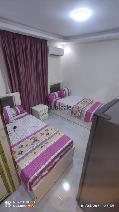 Studio for rent including electricity and all services in the best location in 6th October City, 1st district, neighborhood 4, next to all services, hospitals, cafes, restaurants, schools, and universities. We have more than one fully furnished hotel-style studio for rent or sale. The studio consists of 2 beds, a wardrobe, and a rug.