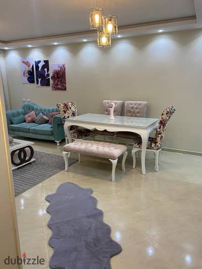 Furnished apartment for rent in Dar Misr 12 Compound, Sheikh Zayed. The apartment features 3 bedrooms, 2 bathrooms, a spacious reception area, and 2 b