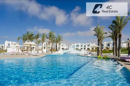 شالية للبيع دايركت ع حمام السباحة 2 نوم جاهز علي السكن بمرحلة new rhodes في قرية ماونتن فيو راس الحكمة Mountain View Village Ras El Hekma
