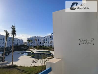 Chalet for sale directly on the swimming pool 2 bedrooms ready to move in at the New Rhodes phase in Mountain View Village Ras El Hekma