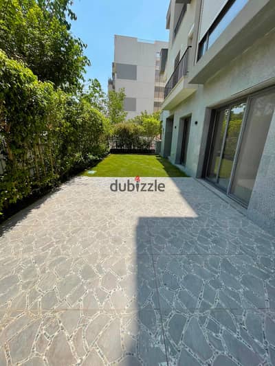 Apartment ground floor with garden for rent in Eastown sodic,with kitchen and ACs,fifth settlement new cairo.