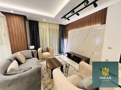 شقة متشطبة تسليم فوري وبالتكيفات والمطبخ في العاصمة الادارية - كمبوند لاكبيتال من بيراميدز