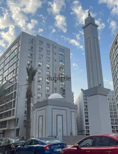Apartment for sale in Compound One Qatamiya  185 m half finishing with an open view overlooking car agencies and an explicit northern facade