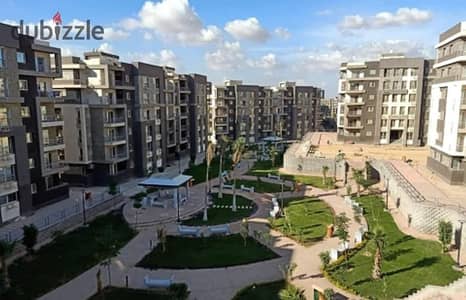 130 sqm apartment for sale at EGP 5,350,000 (negotiable), overlooking the largest landscape area and swimming pools in Janna Zayed 2, Sheikh Zayed Cit
