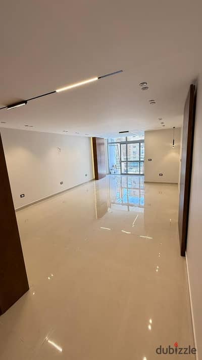 Apartment for sale in Compound One Qatameya, 173 m, super lux with kitchen and dressing, view of the Martyr Axis and Shell Out.