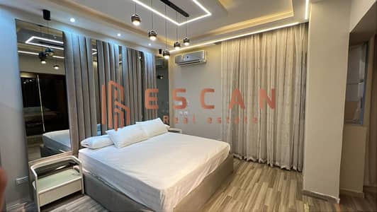 Furnished apartment for rent in Madinaty B8, hotel-style finishing and furnishing, prime location, ground floor with private garden