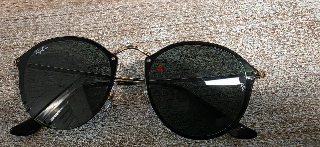 Ray-Ban Blaze Round sunglasses (model RB3574N). 8
