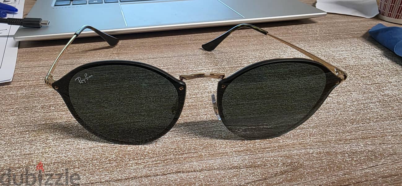 Ray-Ban Blaze Round sunglasses (model RB3574N). 9