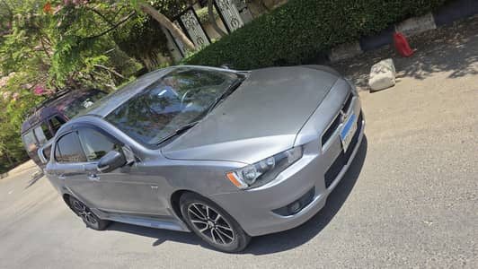 Mitsubishi Lancer 2015 اعلى فئه بصمه بدون فتحه