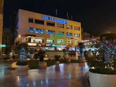 For rent partition in  el sheikh zayed on Al-Bustan Street next to Majara Mall, Park Street, and Trivium Mall.